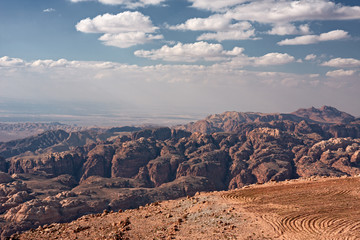 Panoramic view of the rocky desert in the area of the archaeological site of Petra in Jordan.