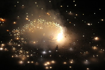 Colorful fireworks in night, bright sparkler candle for Christmas or new year Festival celebration...