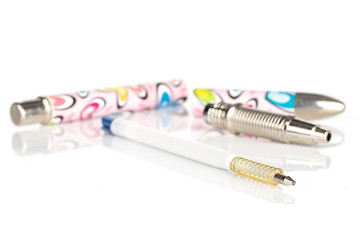 Obraz premium Group of four pieces of writing ballpoint pen isolated on white background