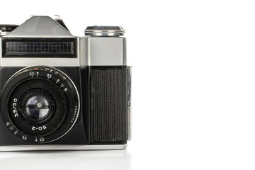 One whole arranged vintage camera isolated on white background