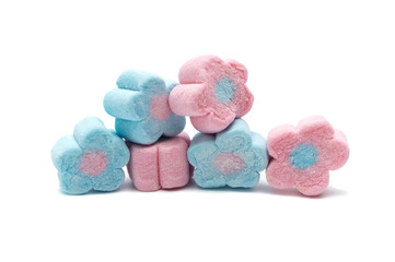 Pastel sweet flowers shape of marshmallows isolated on white background.