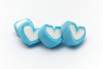 Blue sweet heart shape marshmallow on white background.