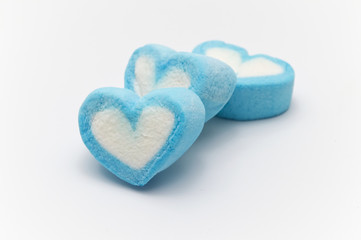 Blue sweet heart shape marshmallow on white background.