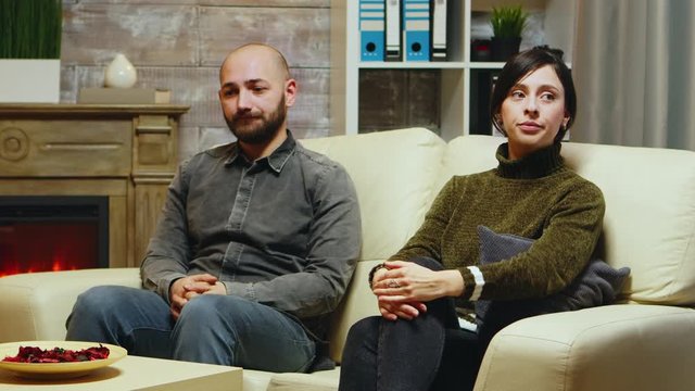 Husband and wife in psychoanalyst cabinet