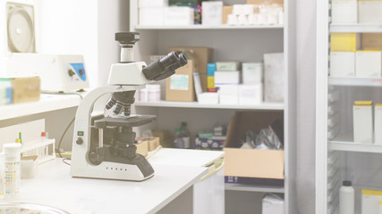 microscope in the analysis laboratory of the veterinary clinic