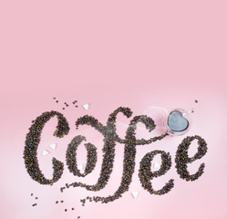 beans spelling the word coffee break and some beans on the bottom isolated on white background.