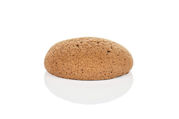 One whole sweet brown chocolate sponge biscuit isolated on white background