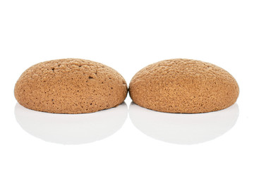 Group of two whole sweet brown chocolate sponge biscuit isolated on white background