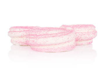 Obraz na płótnie Canvas Group of three whole pink sweet meringue isolated on white background