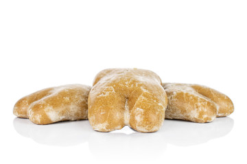 Group of three whole sweet brown gingerbread isolated on white background