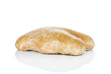 One whole sweet brown gingerbread isolated on white background