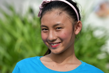 A Smiling Minority Teen Girl
