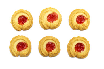 Butter cookies strawberry jam topping and sweet flavored. Set of biscuits cracker homemade isolated on white background. Top view.