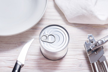 Tin Canned meal on kitchen table, top view