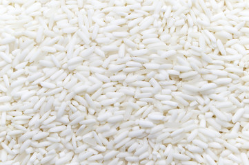 Rice grains full frame background.