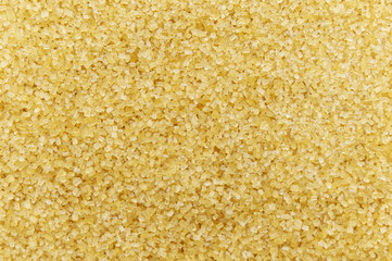 Brown sugar close up full frame background. Top view. Flat lay