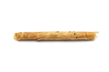 Tong Muan (crispy egg roll mix with sesame), Thai dessert Roll wafer, A traditional dessert in Thailand   isolated on white background.