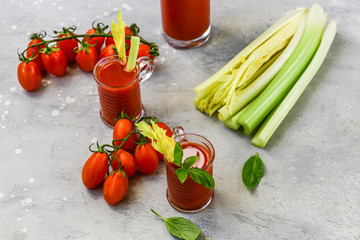 Healthy soft drink  with tomatoes and celery. vitamin smoothies tomato juice, vegetable juice healthy food, selective focus image