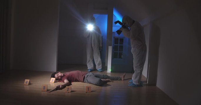 Forensic Expert Working On A Crime Scene
