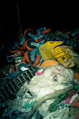 Garbage pile in trash dump or landfill, various types of wastes such as, spare parts, iron, rustic metal. Global warming concept 