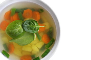 Vegetable soup isolated on white background