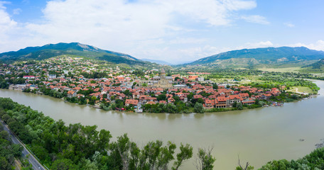 Panoramic view of Mtskheta, The Old Town Lies At The Confluence Of The Rivers Mtkvari And Aragvi. Svetitskhoveli Cathedral, Ancient Georgian Orthodox Church, Unesco Heritage In The Center.