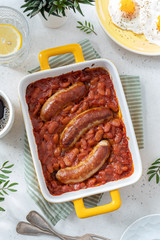 Baked beans in tomato sauce with sausages
