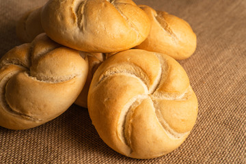 small bread on top of sackcloth