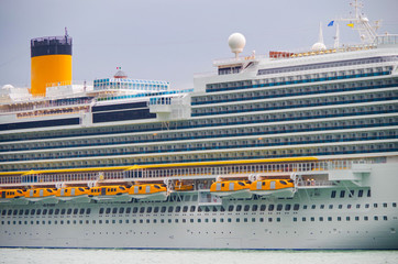 Detaill and close up view of side with hull and superstructure of modern Costa Cruises cruiseship...