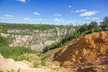Fototapeta na wymiar Old emerald ore quarry mining at summer day