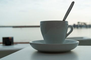 cup of coffee in the beach