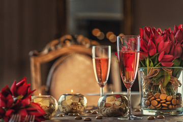 Naklejka na ściany i meble valentines day background with roses, candles and champagne in hotel or restaurant, romantic evening 