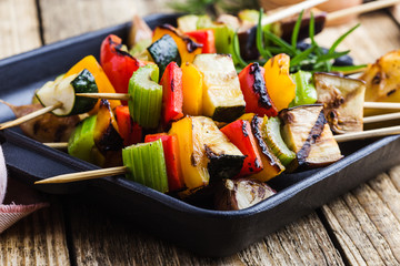 Plant based vegan skewers,  fresh grilled vegetables in cast iron skillet