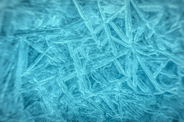 Fototapeta premium Frozen water. Snowflakes sparkling in the sun 
