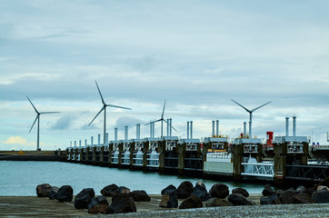 Oosterscheldekering, the Netherlands, August 2019. In Zeeland, wind farms are the setting for the...