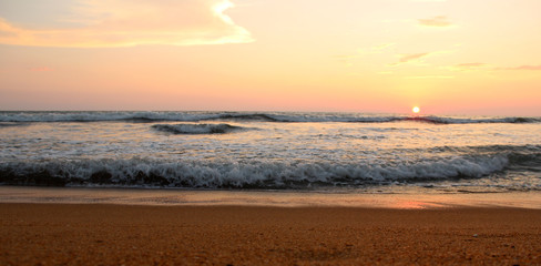 Fototapeta na wymiar morning seascape with sun and clouds