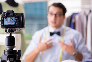 Young man working as fashion video blogger