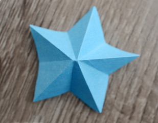 Single blue paper star origami