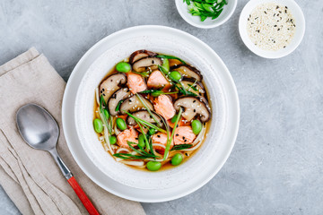 Salmon Noodle Soup with shiitake mushrooms, edamame beans and green onion.