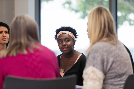 Women talking in support group circle