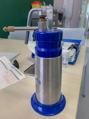 close up of a container full of liquid nitrogen in a dermatology clinic, it is used to remove...