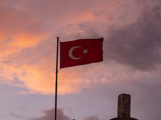 Turkish flag flying at tourist site in Cappadocia, Turkey
