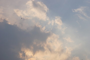 The blue sky and he white and greyish clouds