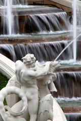 Fototapeta na wymiar Artistic fountain in a park of Vienna