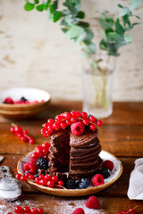 Chocolate pancakes stuffed chia jam..dark photo