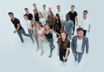 top view. a group of confident young men striding forward