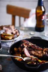 Roast Bavarian ham hocks with beer, caraway and juniper..style rustic.
