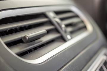 Air conditioner in modern compact car close up
