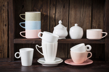  kitchen dishware on old dark wooden background