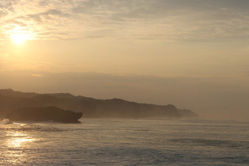 The view of the beach with beautiful sunset